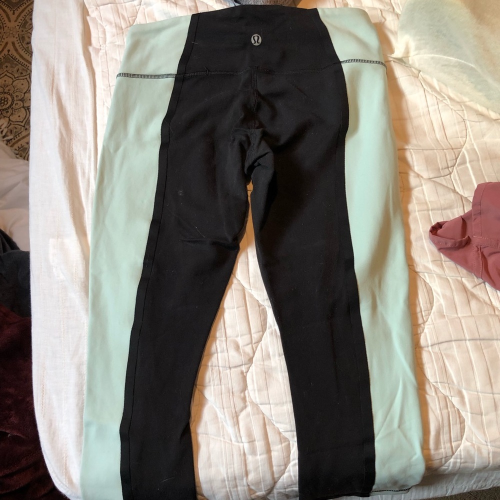 Mint green and black lululemon cropped leggings
